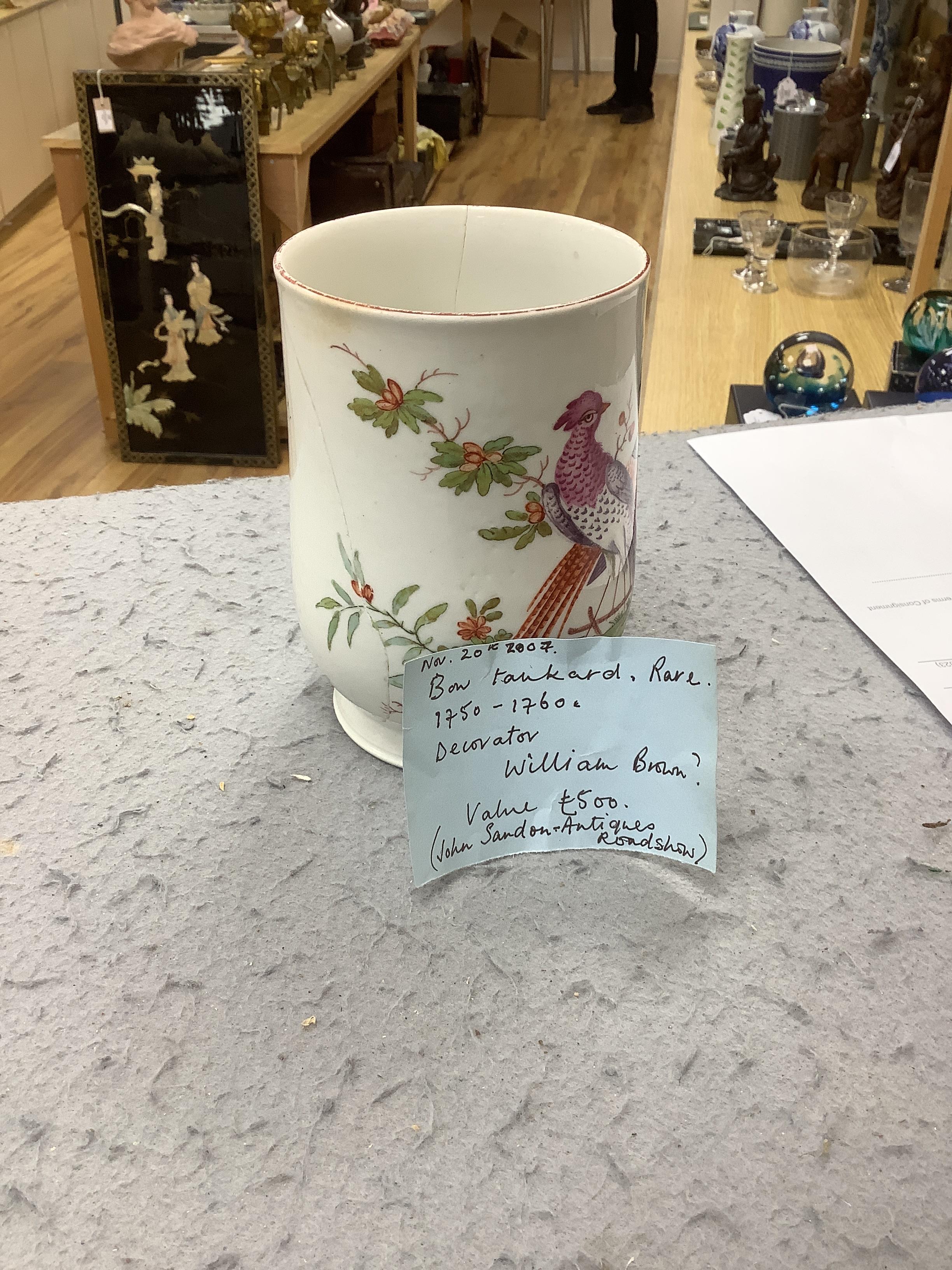A large 18th century Bow ‘Fantastic Birds’ porcelain mug, 15cm (a.f)